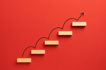 Climbing to Success: A visual representation of progress, with wooden blocks forming steps ascending against a striking red backdrop. A hand-drawn arrow illustrates the journey of growth and ambition