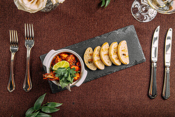 Portion of gourmet delicacy royal shrimp with toasted bread