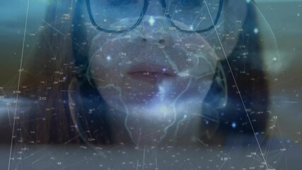 Woman analyzing data in tech workspace, with holographic world map and numeric overlays