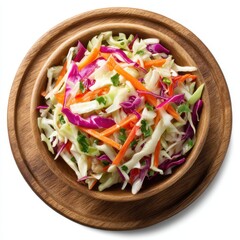 Coleslaw salad in a wooden bowl on a wooden plate