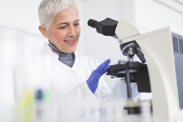 Senior female scientist working in laboratory