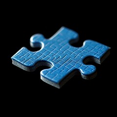 Fototapeta premium Close-up of a blue puzzle piece on a black background, showcasing intricate details.