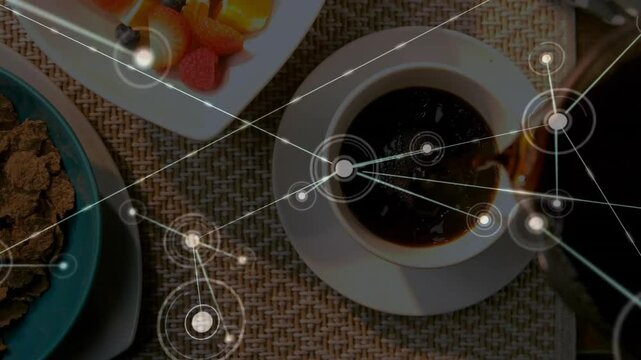 Flat design showing overhead breakfast with coffee cup, fruit skewers and network graphics