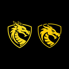 Obraz premium Set of Two Fiery Yellow Dragon Head Esport Gaming or Fantasy Mascot Logos in Shields
