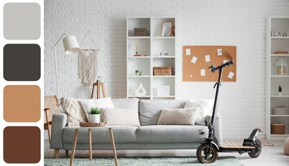 Interior of living room with electric scooter, sofa and rack. Different color patterns