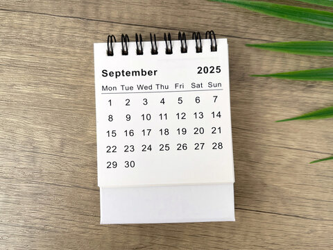 2025 September desk calendar flat lay