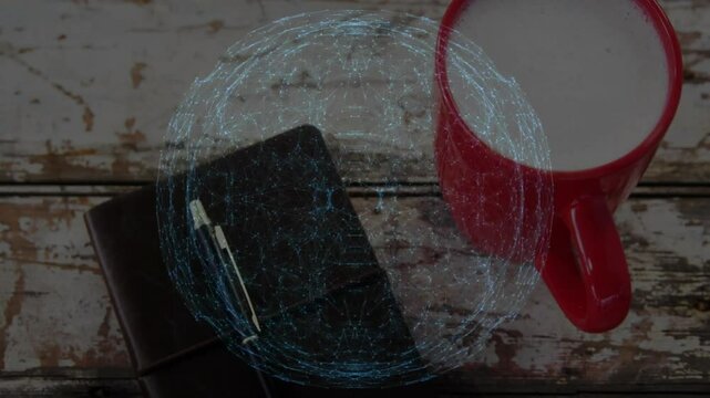 Notebook resting diagonally on wooden table, mug steaming beside hovering digital network sphere