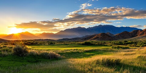 Fototapeta premium Breathtaking Sunrise Over Layered Mountain Range with Warm Hues and Soft Clouds Creating a Peaceful and Serene Natural Scenic Landscape