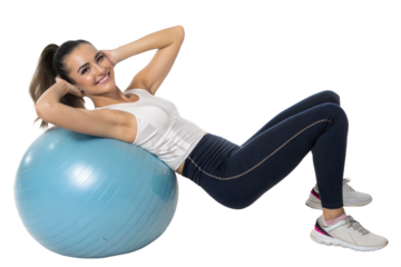 Woman doing abdominal exercise on fitness ball at the gym
