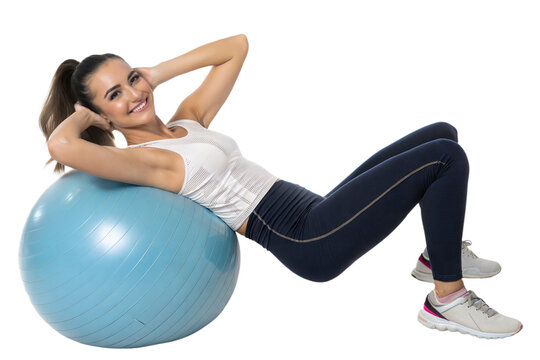 Woman doing abdominal exercise on fitness ball at the gym - Powered by Adobe