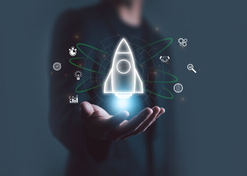 Startup business start-up with technology background as a rocket image conveying the idea of ​​launching a well-planned new business.
