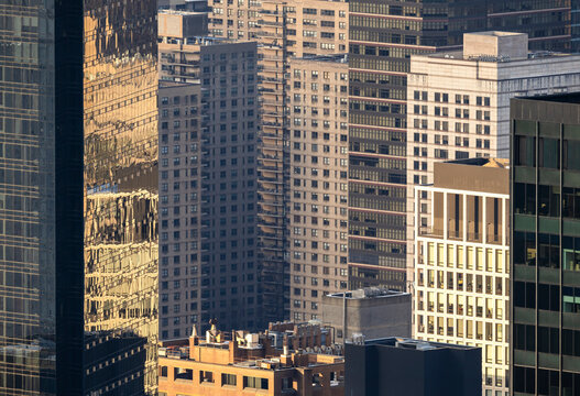 High angle view of New York high-rise buildings in sunlight
