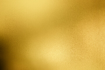 Gold wall texture background. Yellow shiny gold paint on concrete wall surface, vibrant golden luxury wallpaper, horizontal