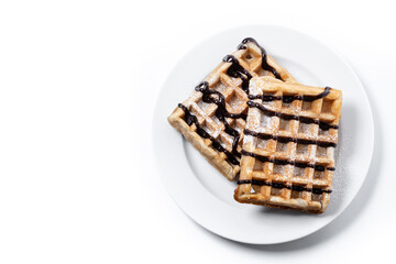 Belgian Waffles with chocolate isolated on white background. Top view. Copy space
