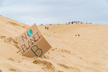 Environmental message on a sign in the Grande dune du Pilat