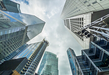 Dramatic upwards view of modern skyscrapers in Singapore