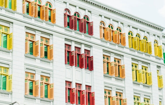 Colorful window shutters on a historic building in Singapore