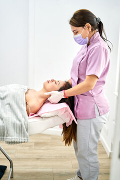 A trained therapist provides a calming massage to a client at a beauty