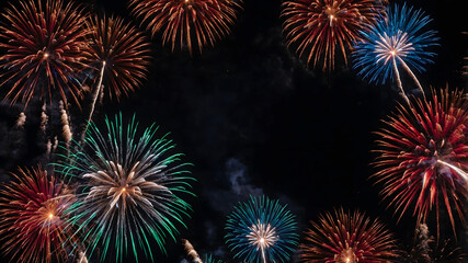 Naklejka premium From below, shot of stunning brilliant fireworks erupting on the background of black night sky.