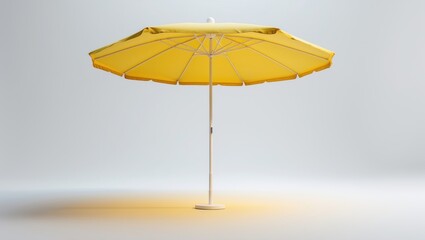 Obraz premium Single yellow parasol at the beach against a plain white backdrop, perfect for summer vacation