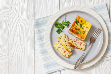 Baked Denver Omelette on a plate with fork