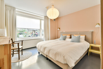 A serene and inviting modern bedroom featuring soft color palettes, natural light, and minimalist decor, perfect for relaxation and tranquility.