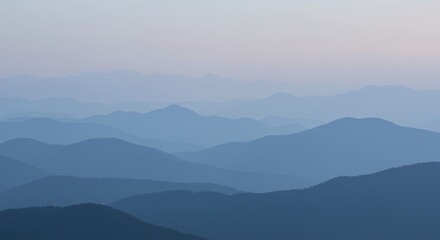 Fototapeta premium Ethereal Blue Mountainscape: Layers of Misty Peaks at Dawn, Evoking Serenity and Vastness in the Appalachian Range Landscape.