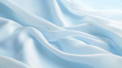 Obraz premium Smooth, light blue fabric drapes in soft folds