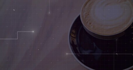 Black coffee cup being displayed on wooden table, featuring latte art and digital grid overlay - Powered by Adobe