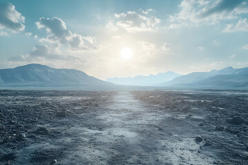 Vast, desolate landscape path leading to a distant mountain range.