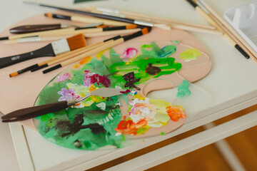 Obraz premium watercolor paints and brushes