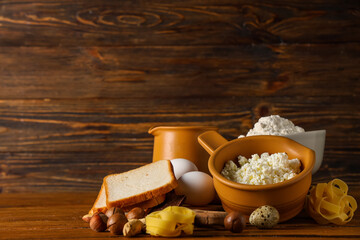 Different products on wooden table. Food Allergy Awareness Month