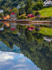 View of norwegian landscape with houses on the water