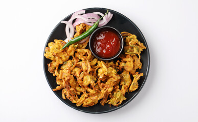 Indian street food snack called onion pakoda making gram flour and onion
