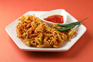 Indian street food snack called onion pakoda making gram flour and onion