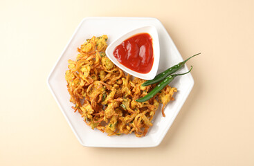 Indian street food snack called onion pakoda making gram flour and onion