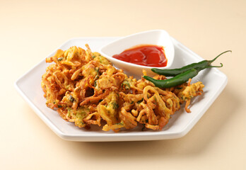 Indian street food snack called onion pakoda making gram flour and onion