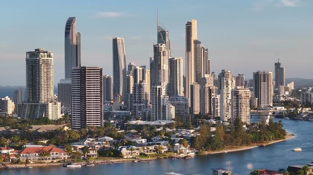 Skyscrapers and high rise buildings in Gold Coast city downtown, sunset light. Australia