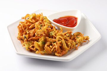 Indian street food snack called onion pakoda making gram flour and onion