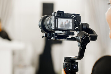 A professional black camera for taking photos and videos at the holiday. 