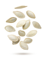 Pumpkin seeds flying close-up on a white. Isolated