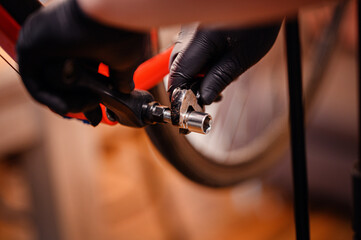 Tightening Bicycle Pedal with Wrench in Close-Up View