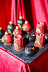 cake, sweets in the shape of perfume bottles and candles