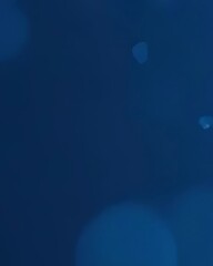 Naklejka premium Abstract Blue Bokeh Background: Dark, Moody, and Textured