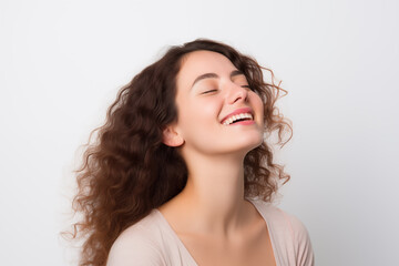 Naklejka premium Joyful Woman's Laughter, A Portrait of Happiness, Studio Shot, Background