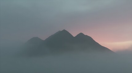 Misty mountains dawn silhouette