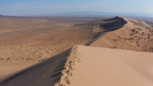 Dune on a sunset, drone view