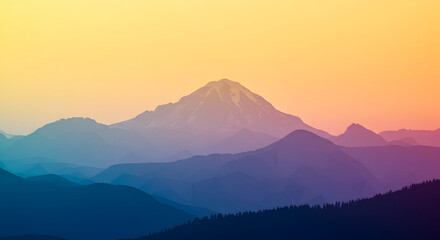Naklejka premium Abstract Mountain Range Silhouette With Warm Colored Sky At Sunrise