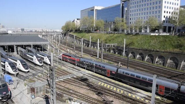 April 8 Paris, France. Locomotive depot. A train is moving nearby, slowing down.
