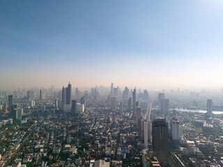 Bangkok city skyline in early morning light. High aerial panoramic urban view of Thailand capital
